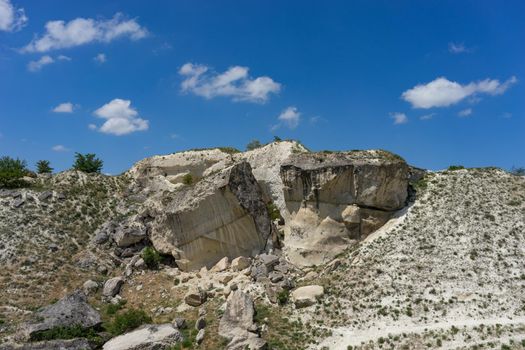 Landscape with a White rock in the Crimea against the blue sky.