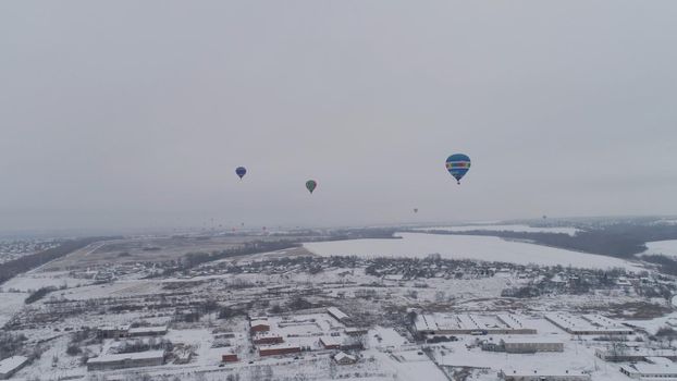 Hot air balloons in the winter season. Aerostat, Airship. Red balloon.