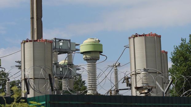 Aerial view Power plant, transformation station, cables and wires. Electrical power transformer in high voltage substation. High voltage electric power substation.
