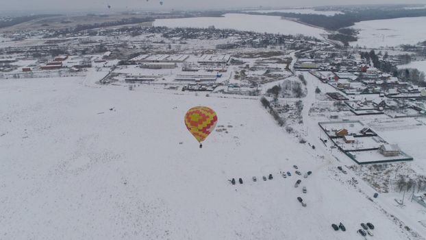 Hot air balloons in the winter season. Aerostat, Airship. Red balloon.