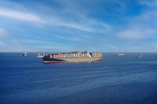 Vladivostok, Primorsky Krai. Seascape with a large container ship on the horizon.
