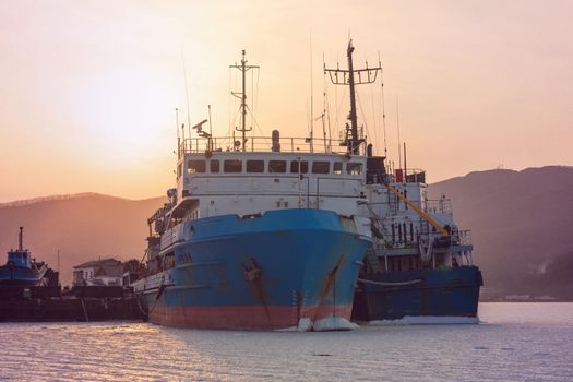 Vladivostok, Russia. Old ships at sunset in the Parking lot in the Bay.