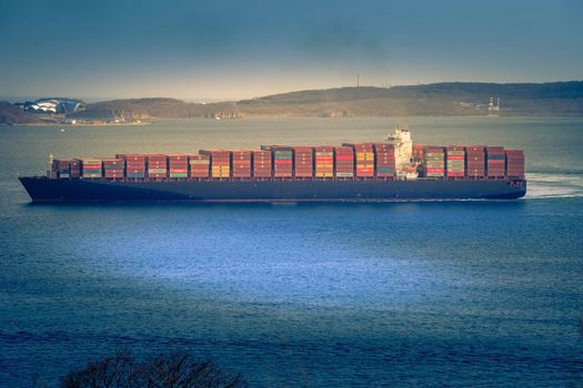 Vladivostok, Primorsky Krai. Seascape with a large container ship.