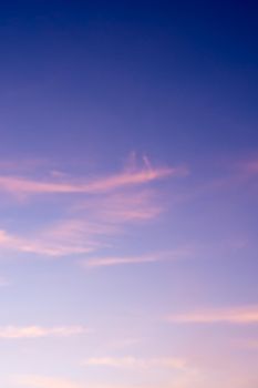 White fluffy clouds in the blue sky with morning light from the sunrise