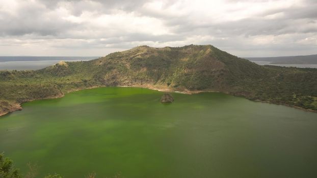 Lake crater at Taal Volcano on Luzon Island North of Manila in Philippines. Volcano with a crater on an island in the middle of a lake. Luzon, Philippines. Travel concept.