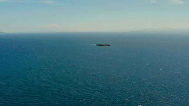 Blue sea surface and tropical islands Pescador, top view. Blue sea surface with waves. Moalboal, Philippines