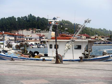 small fishing harbor on the port at sea