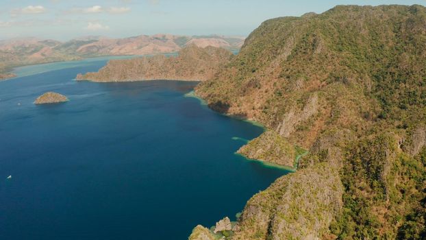 blue lagoons and cliffs of tropical mountain island. aerial view seascape, tropical landscape. Palawan, Philippines, Coron. travel concept