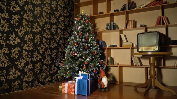 Decorated christmas tree with colorful balls and gifts. Christmas and New Year decorated interior room with presents and New year tree.
