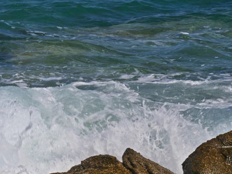 Waves crashing against the rock, natural landscape