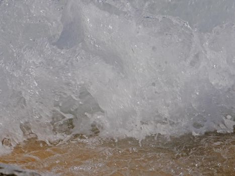 Waves crashing against the rock, natural landscape