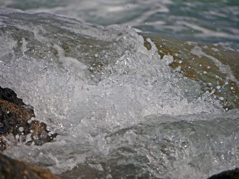 Waves crashing against the rock, natural landscape