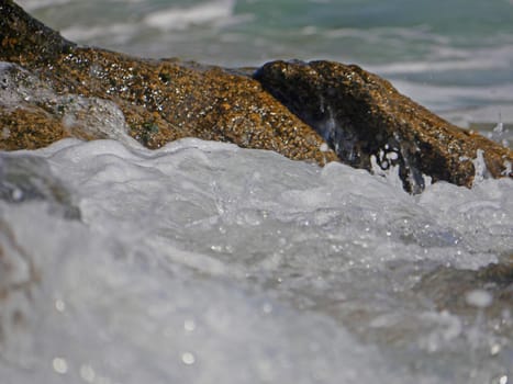 Waves crashing against the rock, natural landscape