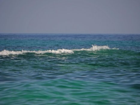 Waves crashing against the rock, natural landscape