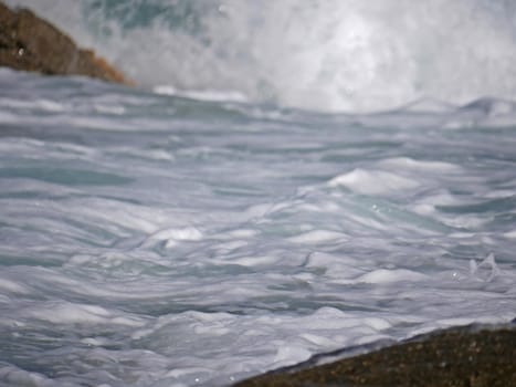 Waves crashing against the rock, natural landscape