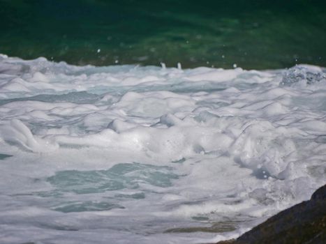 Waves crashing against the rock, natural landscape