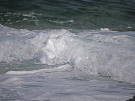 Waves crashing against the rock, natural landscape