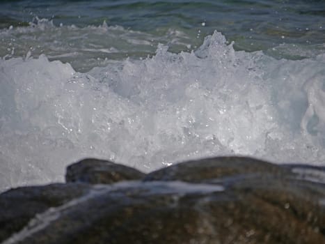 Waves crashing against the rock, natural landscape