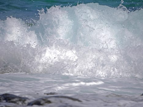 Waves crashing against the rock, natural background