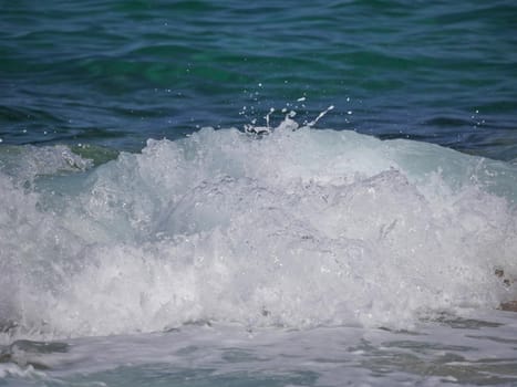 Waves crashing against the rock, natural background