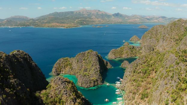 Aerial drone lagoons and coves with blue water among the rocks. lagoon, Kayangan Lake.mountains covered with forests. Seascape, tropical landscape. Palawan, Philippines, Busuanga