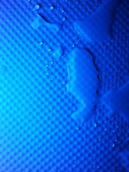 Splashes of water on shower tray highlighted in color 