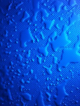 Splashes of water on shower tray highlighted in color 