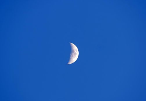 half moon at blue sky, natural background