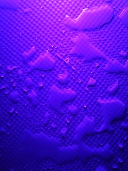 Splashes of water on shower tray highlighted in color 