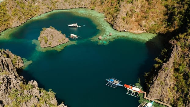 Aerial drone lagoons and coves with blue water among the rocks. lagoon, Kayangan Lake.mountains covered with forests. Seascape, tropical landscape. Palawan, Philippines, Busuanga