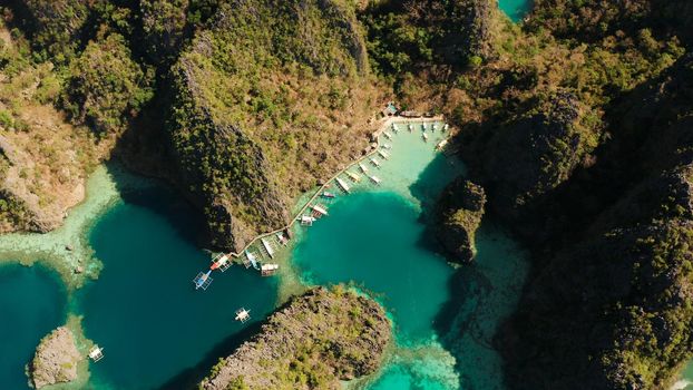 Aerial drone lagoons and coves with blue water among the rocks. lagoon, Kayangan Lake.mountains covered with forests. Seascape, tropical landscape. Palawan, Philippines, Busuanga