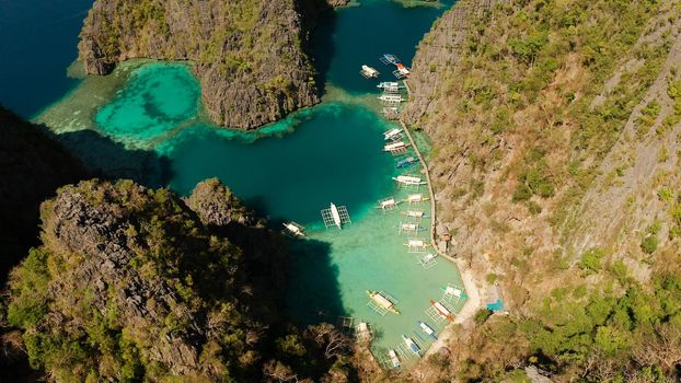 Aerial drone lagoons and coves with blue water among the rocks. lagoon, Kayangan Lake.mountains covered with forests. Seascape, tropical landscape. Palawan, Philippines, Busuanga