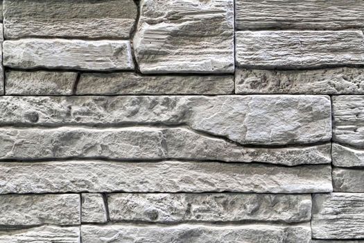 masonry wall paving stones as a background close up