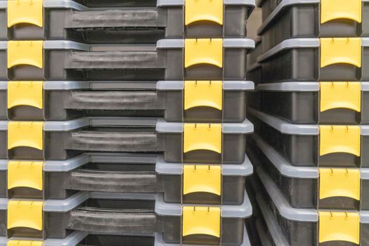 plastic tool boxes stacked like a backdrop. High quality photo