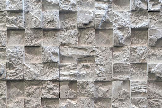 masonry wall paving stones as a background close up