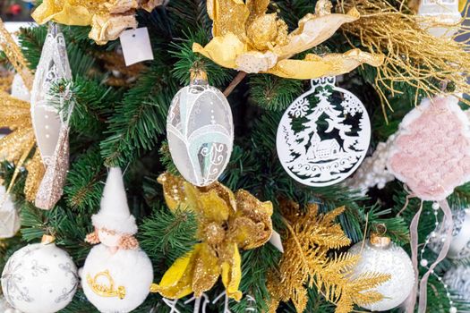 fir branches decorated with christmas toys close up. High quality photo