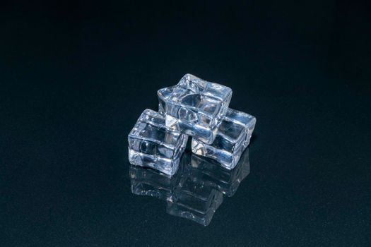 ice cubes on a black background close-up. High quality photo