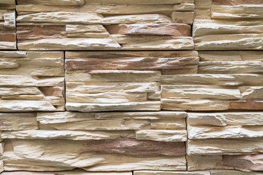 masonry wall paving stones as a background close up