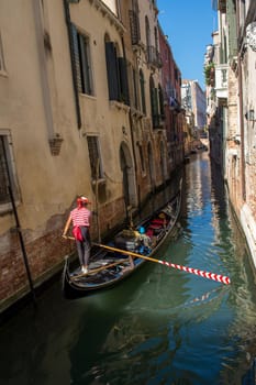 discovery of the city of Venice and its small canals and romantic alleys, Italy