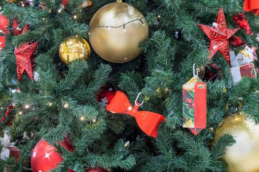 fir branches decorated with christmas toys close up. High quality photo