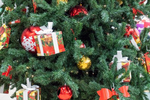 fir branches decorated with christmas toys close up. High quality photo