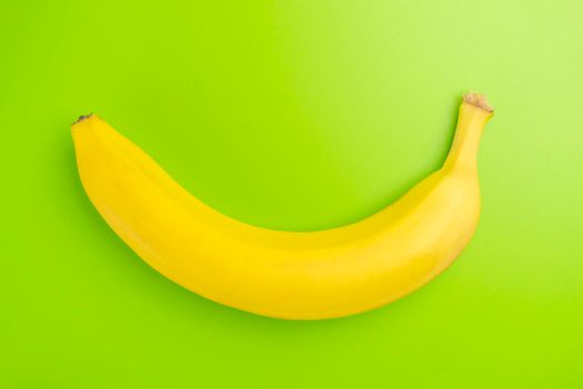banana on a green background close-up.isolate. High quality photo