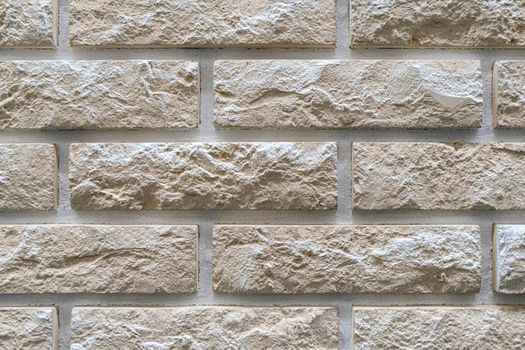 masonry wall paving stones as a background close up
