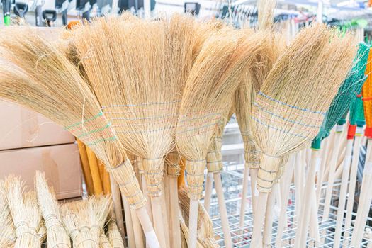 brooms in the store close-up. as background. High quality photo
