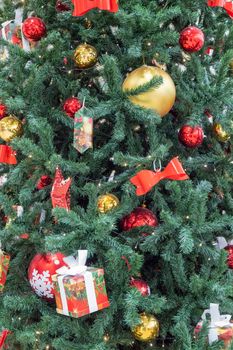 fir branches decorated with christmas toys close up. High quality photo