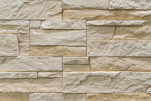 masonry wall paving stones as a background close up