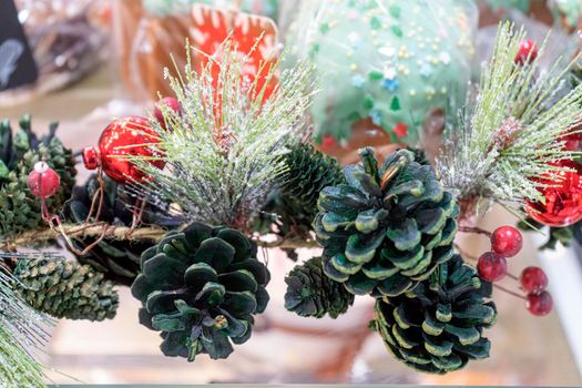 fir branches decorated with christmas toys close up. High quality photo