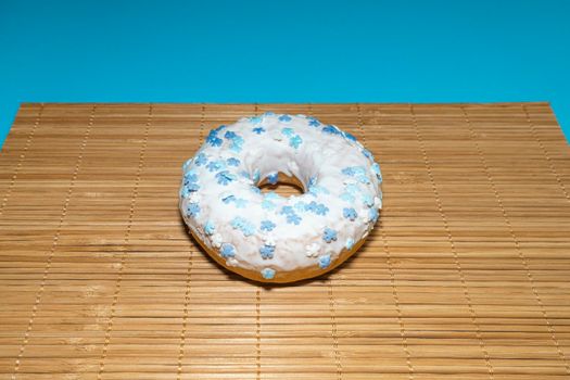 donut donuts on a bamboo background close-up. isolate. High quality photo