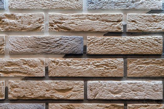 masonry wall paving stones as a background close up