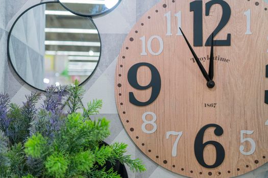 five minutes to twelve on the clock. spruce branches . mirror. hours. new year. Christmasive minutes to twelve on the clock. spruce branches . mirror. hours. new year. Christmas. High quality photo